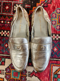 Tory Burch gold loafers
