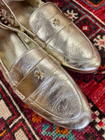 Tory Burch gold loafers
